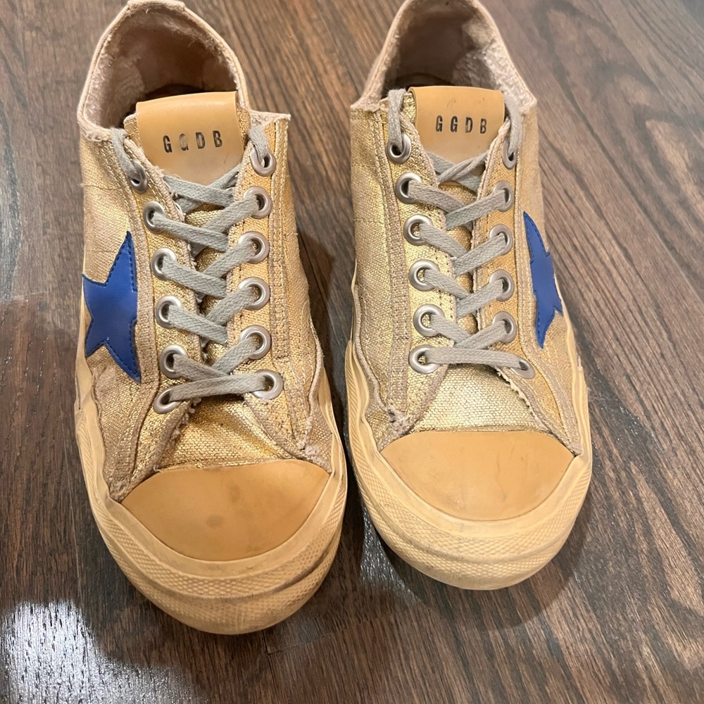 Gold metallic Golden goose with blue star